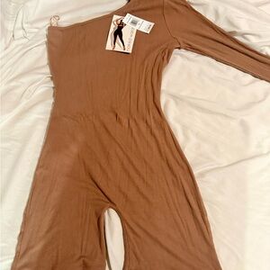 Naked Wardrobe One-Shoulder Ribbed Jumpsuit in Camel